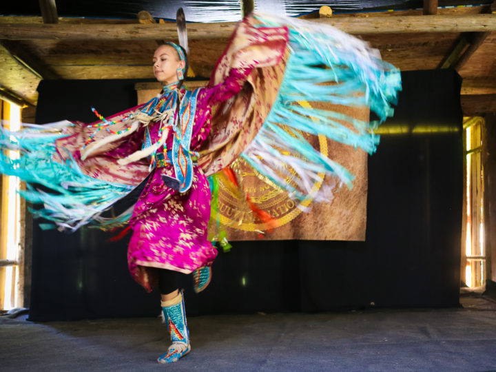 A young Tsuut'ina woman performs a traditional dance at Spotted Elk Camp in Calgary, Canada.