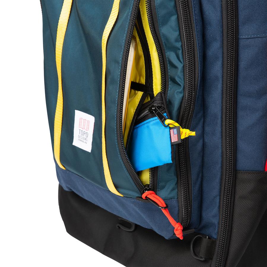 Awkwardly long and narrow interior zippered pockets in the 40L Topo Designs Travel Bag.