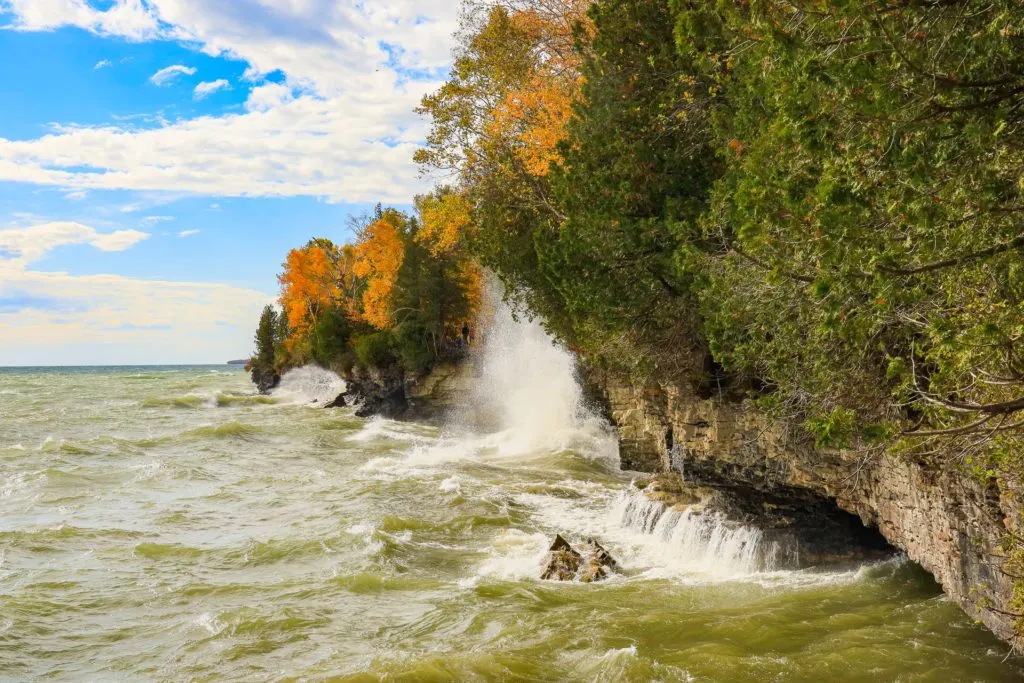 A view of the waves crashing into the caves and coastline at Cave Point County Park in Door County, Wisconsin.
