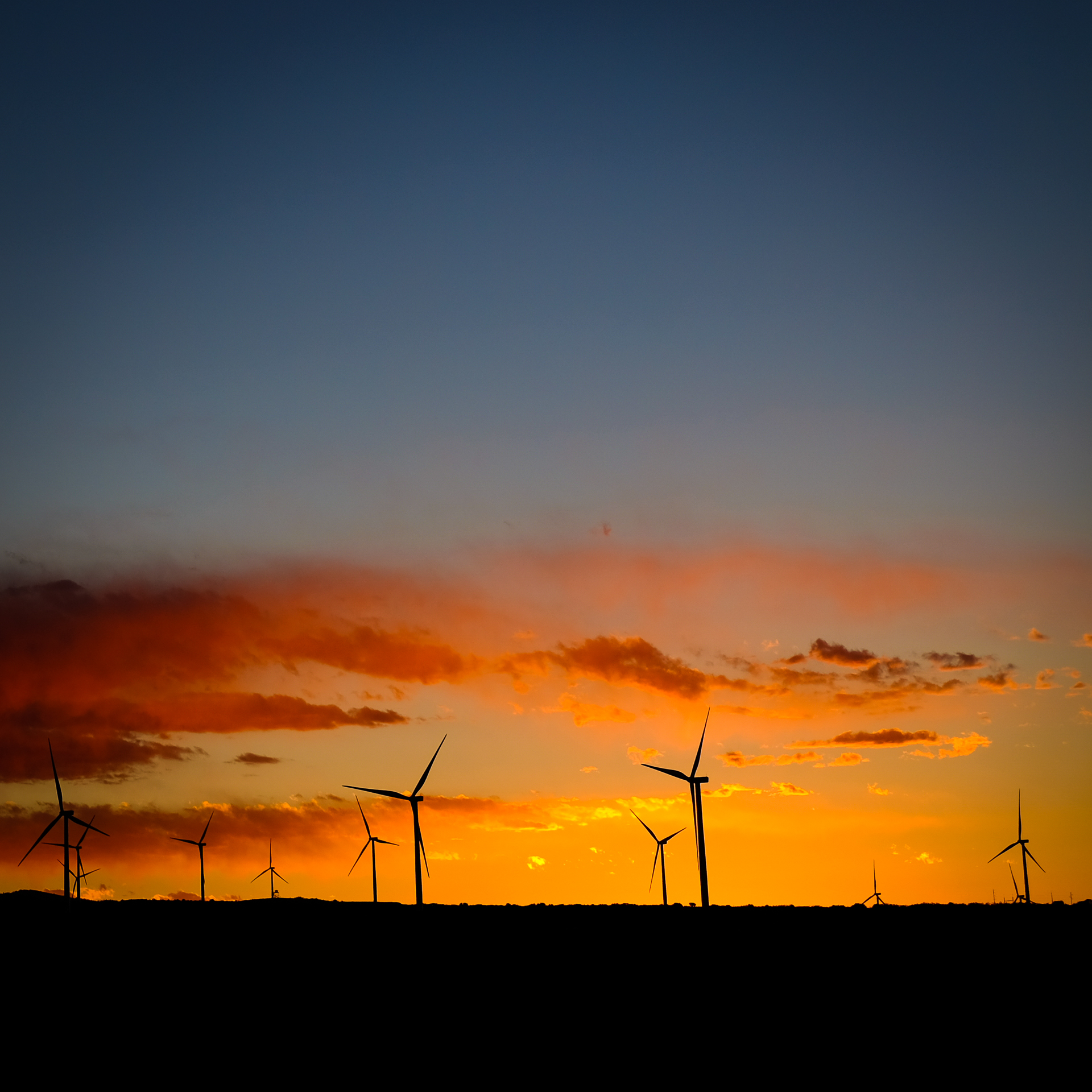 A wind farm in Utah at sunset