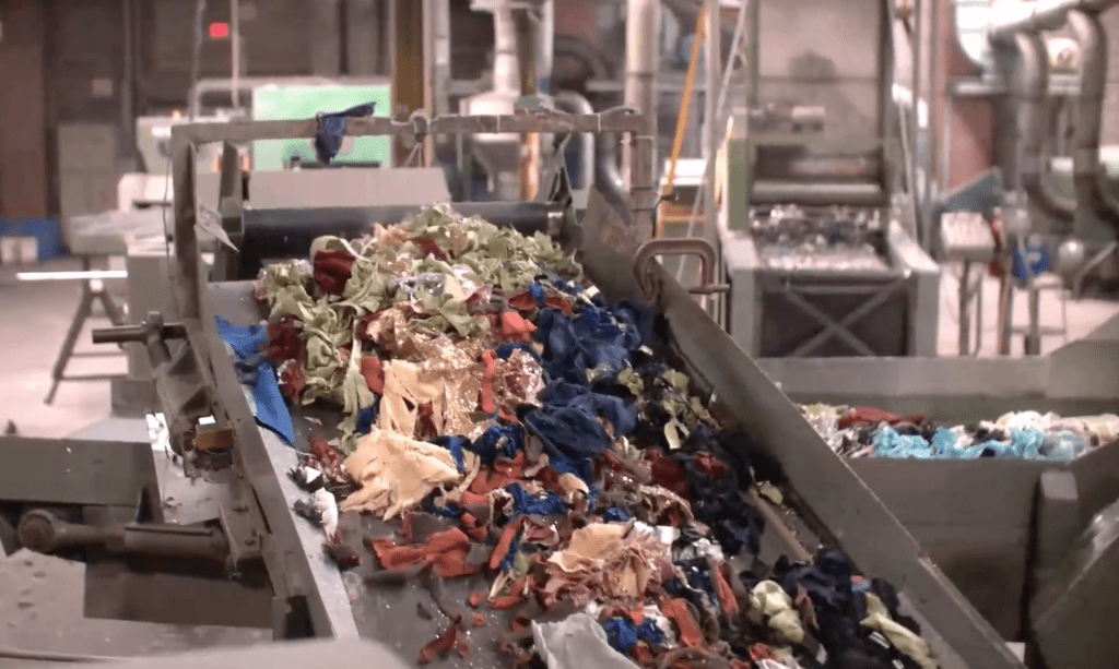 Underwear being recycled into insulation.