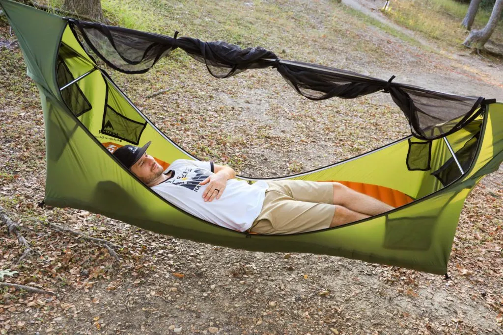 Josh laying flat in the Haven Tent camping hammock.