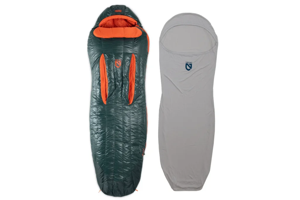 The Nemo Tracer Blaze sleeping bag liner next to a Nemo sleeping bag.