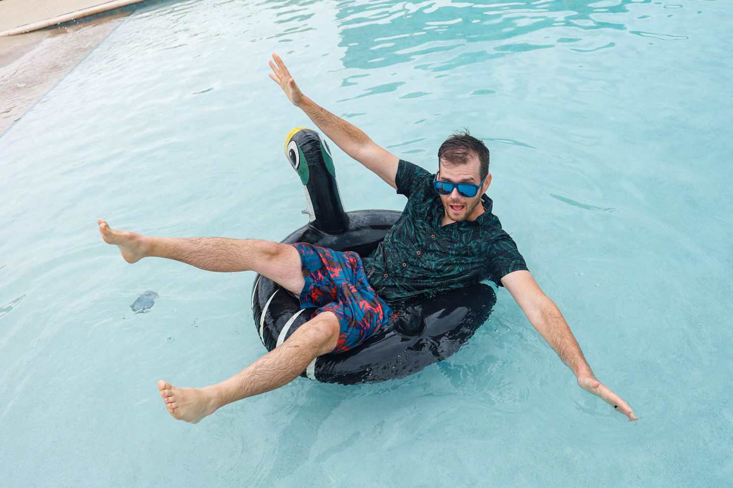 Josh enjoying the pool in his prAna swim trunks.