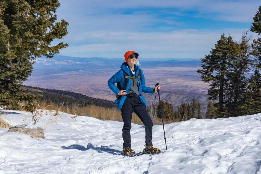 Woman snowshoeing on Sandia Peak in Albuquerque, New Mexico.