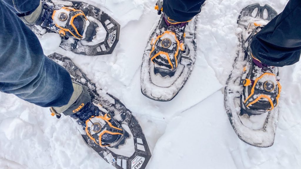 An overhead view of the Symbioz Hyperflex Phoenix and Highlander Adjust snowshoes