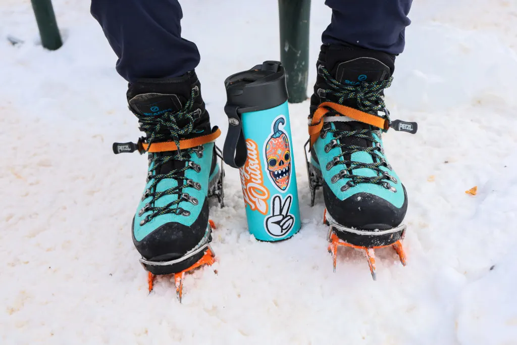 Camp mugs and crampons: A GSI Microlite travel mug matches a pair of boots and crampons.