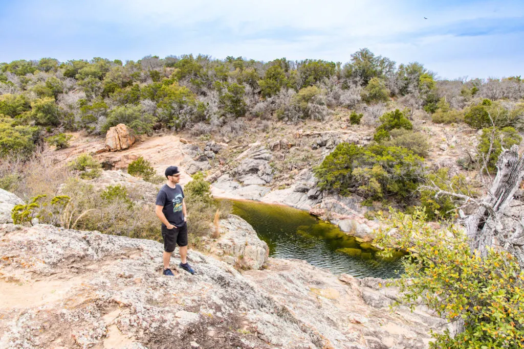 A man takes in the views at Inks Lake State Park.