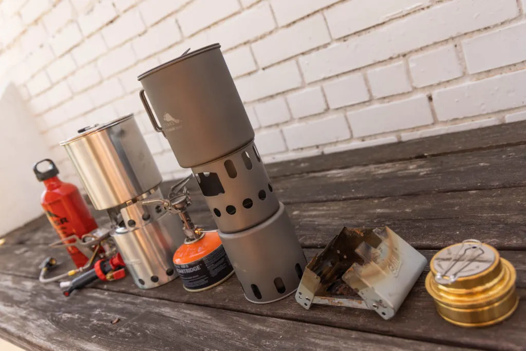 Backpacking stoves lined up.