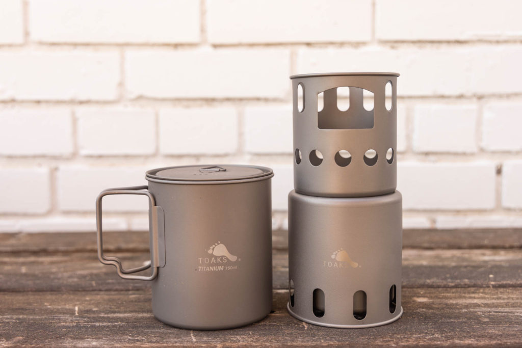 A Toaks ultralight titanium wood-burning backpacking stove and pot.