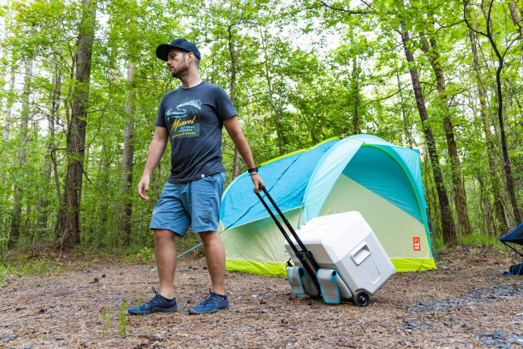 A man pulling The GoSun Chill electric cooler.