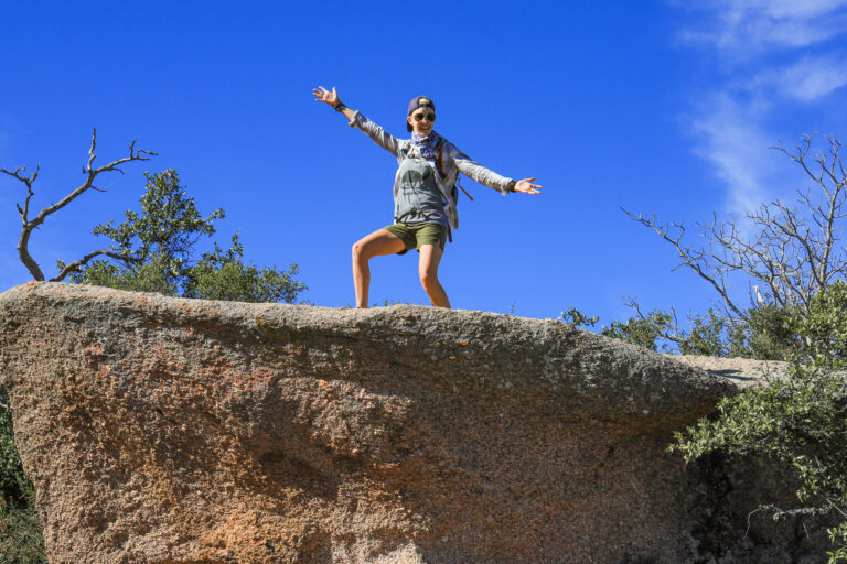 Posing on a boulder at Enchanted Rock.