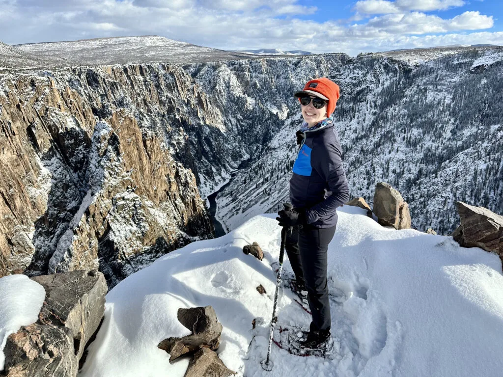A woman snowshoeing at Black Canyon of the Gunnison National Park in Colorado in her TSL snowshoes.