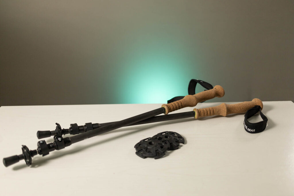 A pair of Diorite Trekking poles on a table.