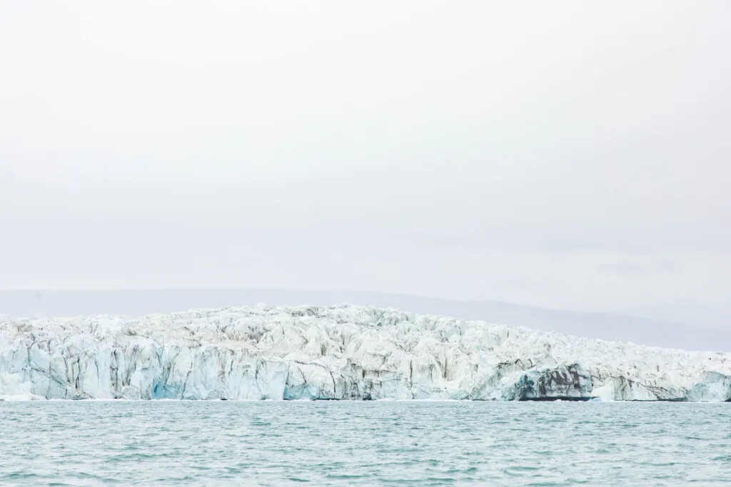 An 11km-wide glacier at the end of a fjord in East Greenland.