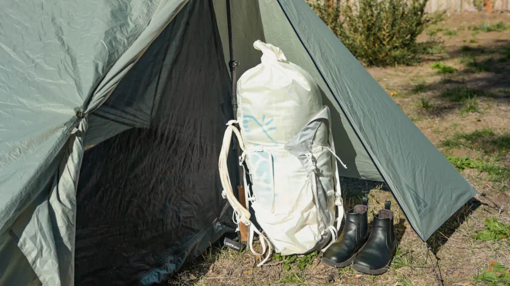 A backpack AND boots (plus so much more) fit easily in the vestibules with room to spare.