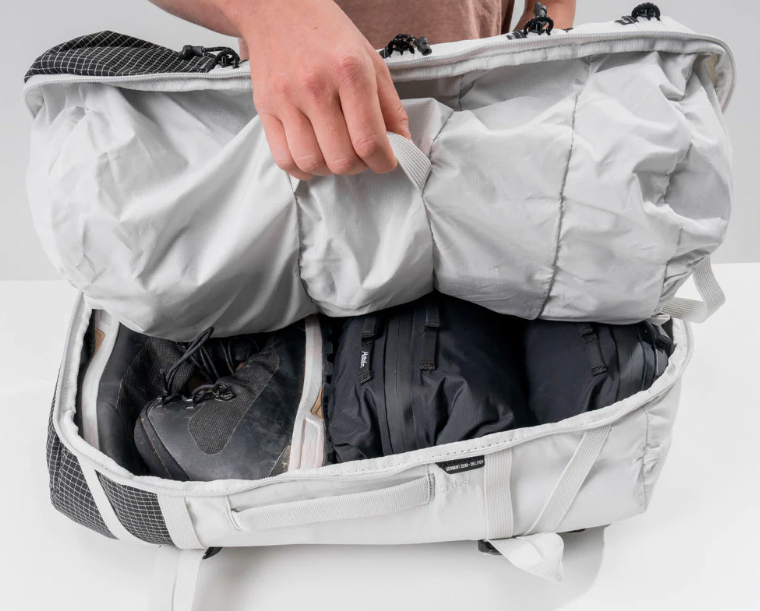 The Matador Travel Pack with bulky items in the base and soft goods in the front pockets (photo from Matador's website).