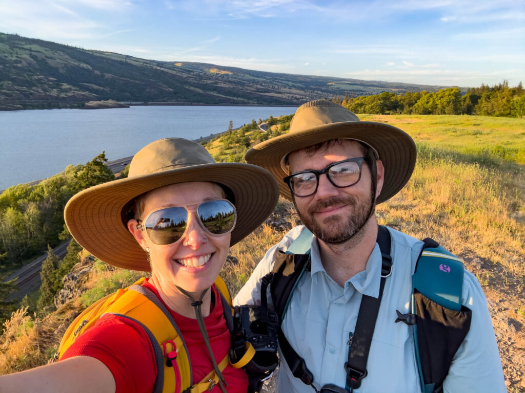 A couple Smiling at the Top of Mosier Plateau.