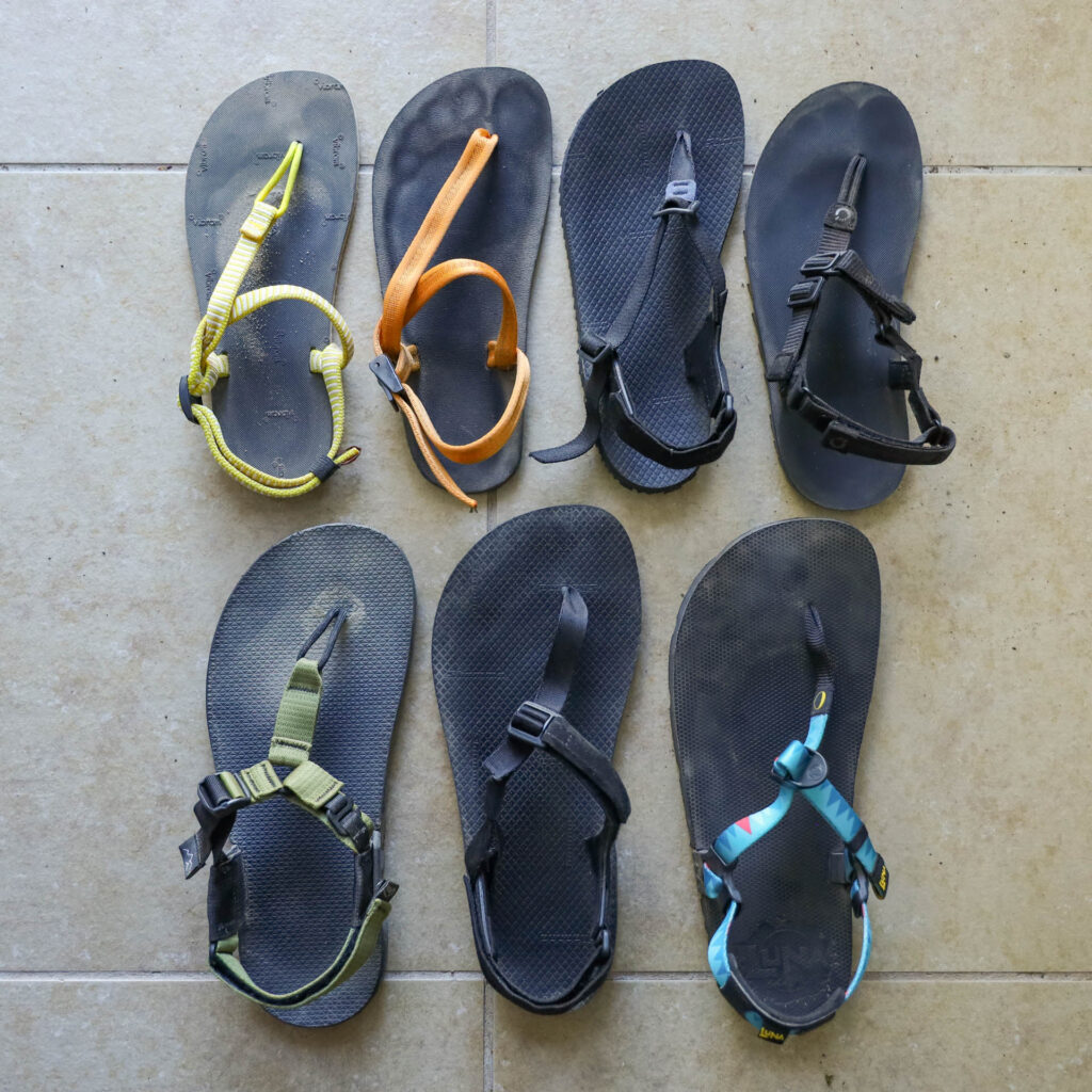A lineup of barefoot and minimalist hiking sandals.