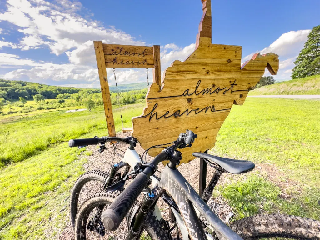 Mountain bikes parked in front of the Almost Heaven swing at Canaan Valley Resort State Park.