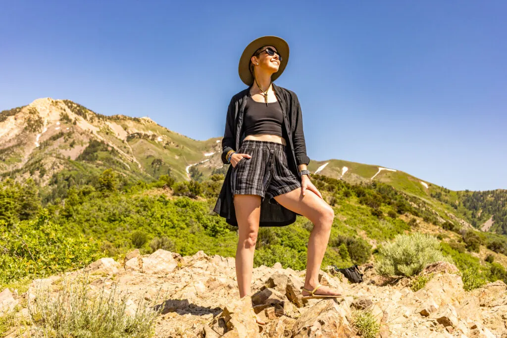 Hiking in organic cotton crop top (Pact), linen shorts (Goodwill), and Tencel button-up (Houdini).