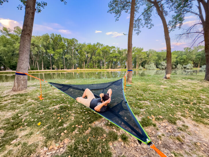 Lounging in the Tentsile Trillium in the park.