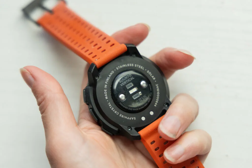 The back of the face of the Suunto Sonic with magnetic charge points.