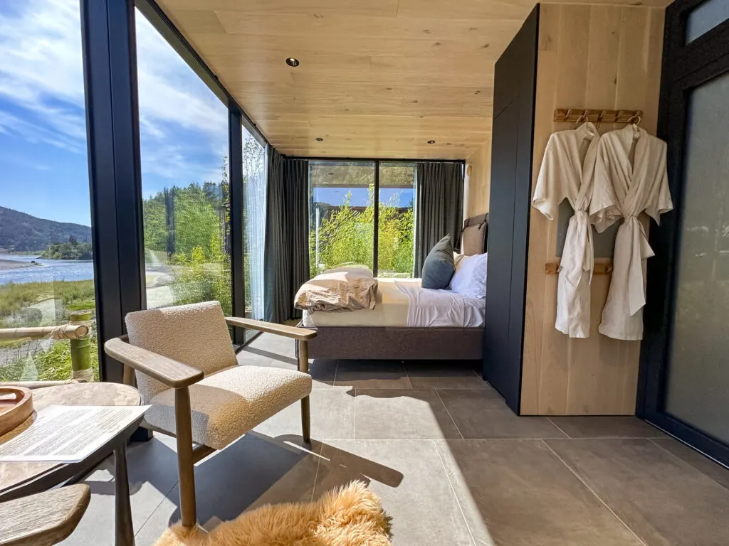 The inside of a glass cabin at Tu Tu' Tun Lodge in Gold Beach, OR.