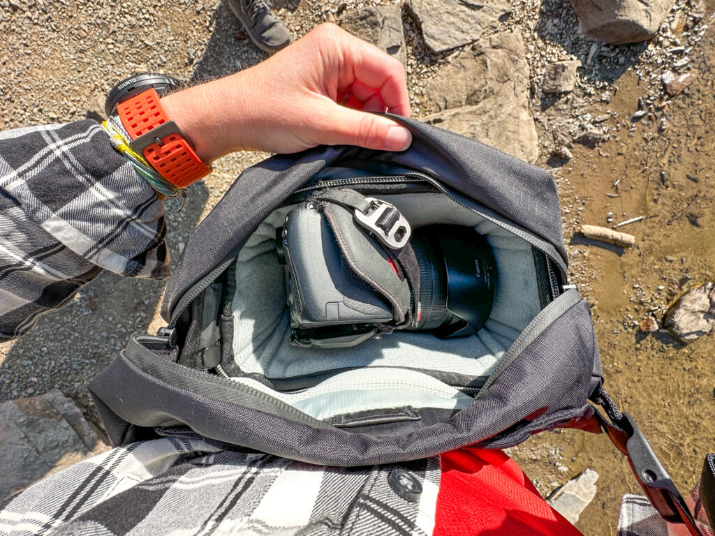 The Peak Design Outdoor Bags 7L Sling with XS camera cube and camera inside.