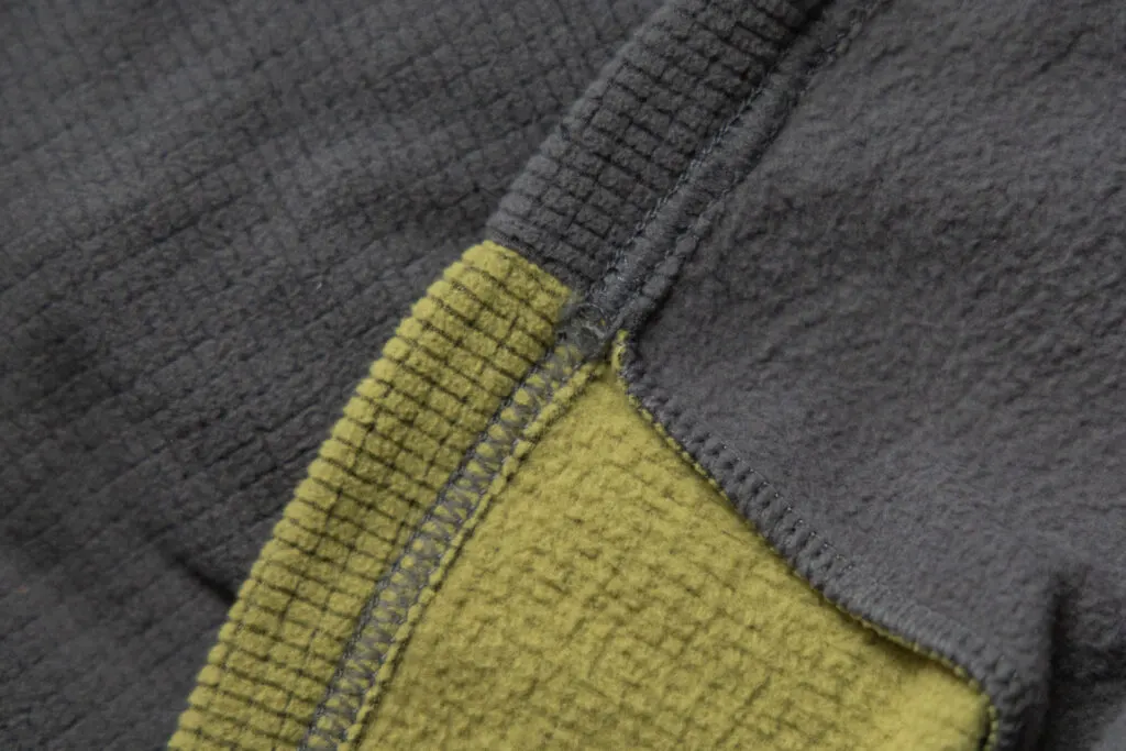 The interior and exterior of the SkyGOAT grid fleece hoodie.