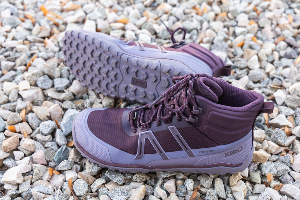 The Xero Shoes Scrambler Trail Mid WP barefoot hiking boots in purple.