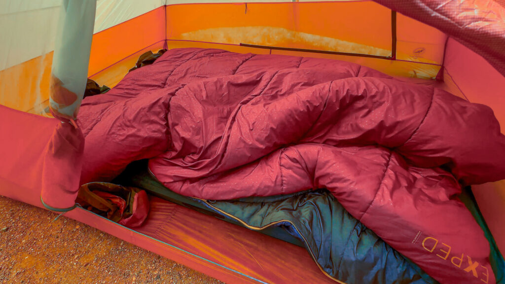 The Exped MegaSleep Duo double sleeping bag in a tent.