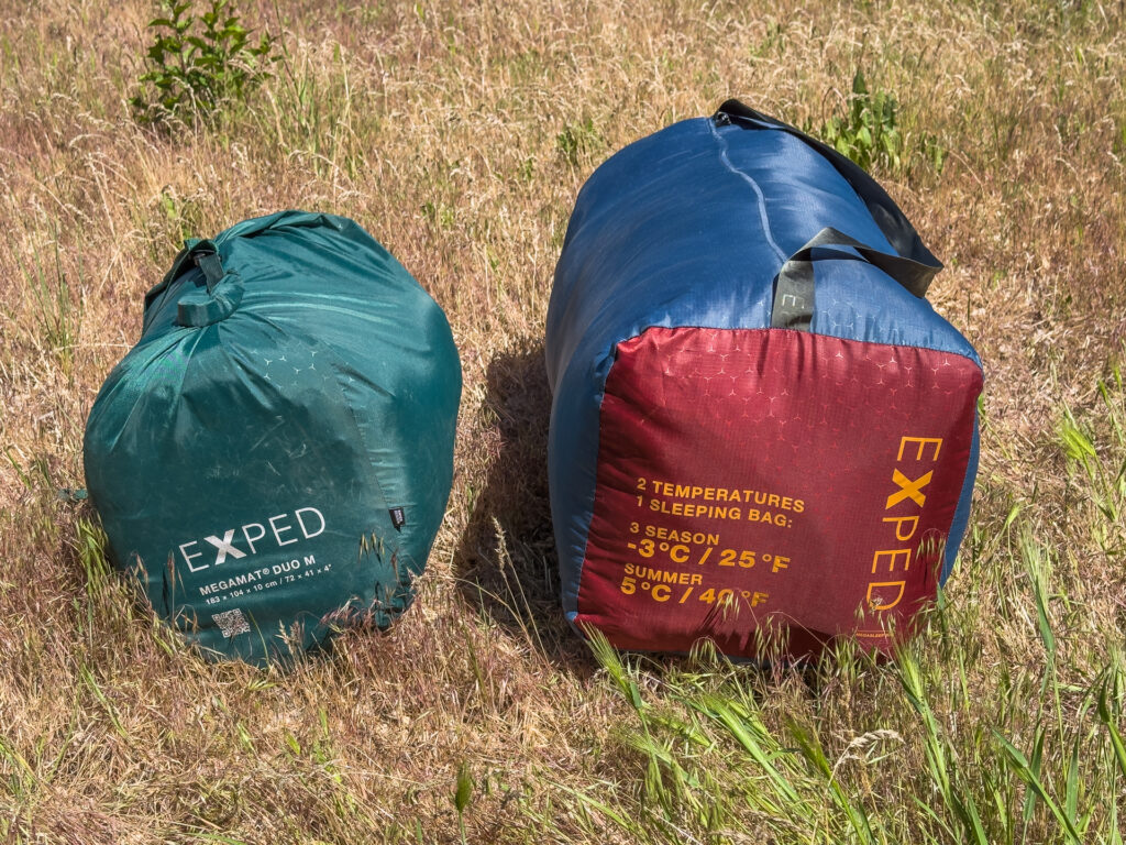 The Exped MegaMat Duo and the Exped MegaSleep Duo packed up.