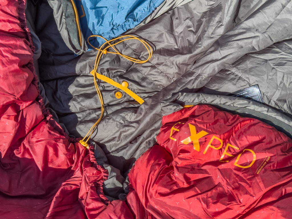 The Exped MegaSleep Duo's cinch cord and accessory pocket.