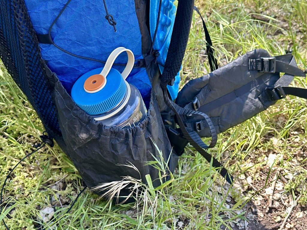 The Zpacks Backpack Super Nero Ultra has large, accessible water bottle pockets.