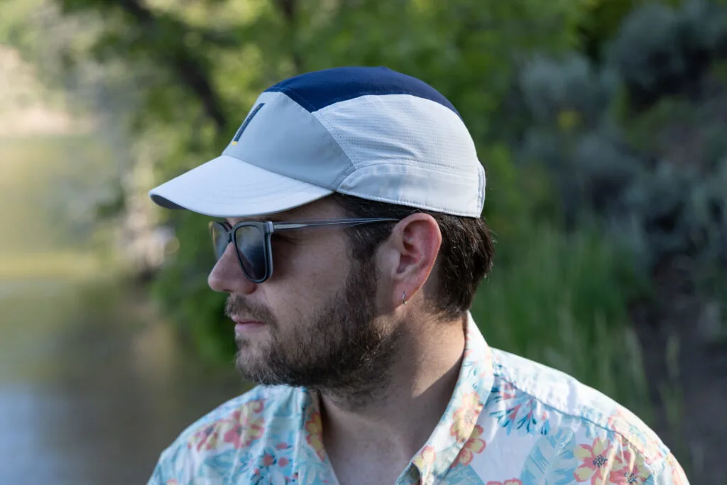 A man wears a Ciele FST Cap.