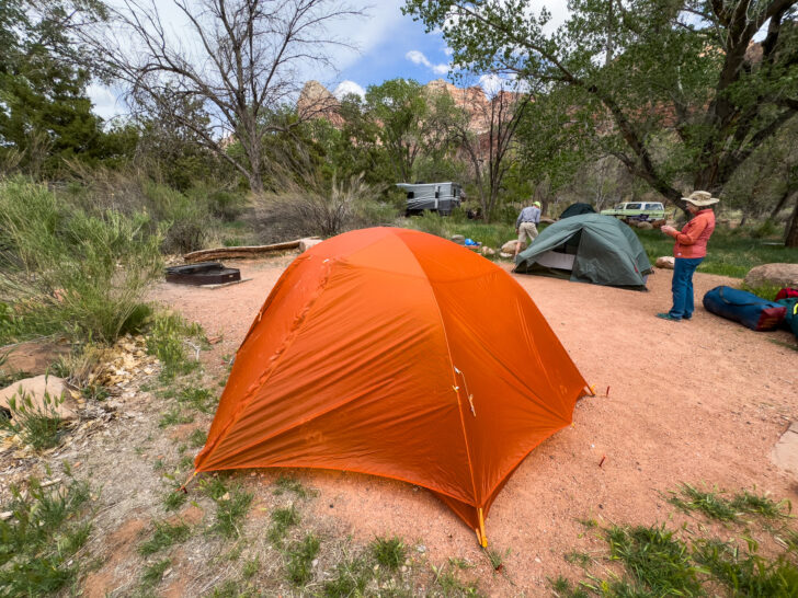REI Half Dome vs Big Agnes Copper Spur: Both tents pitch at a campground.