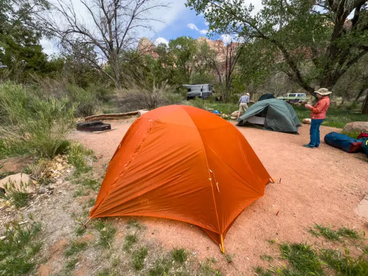 REI Half Dome vs Big Agnes Copper Spur: Both tents pitch at a campground.