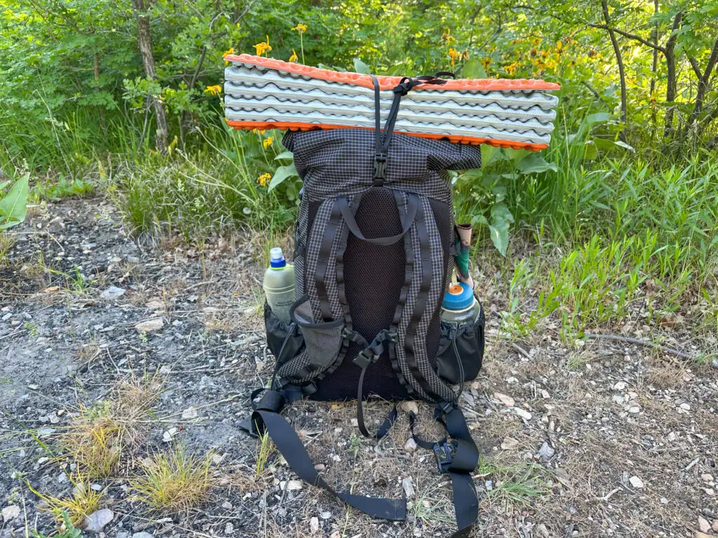 The back panel and S-curve straps of the Symbiosis Gear Aspen backpack.