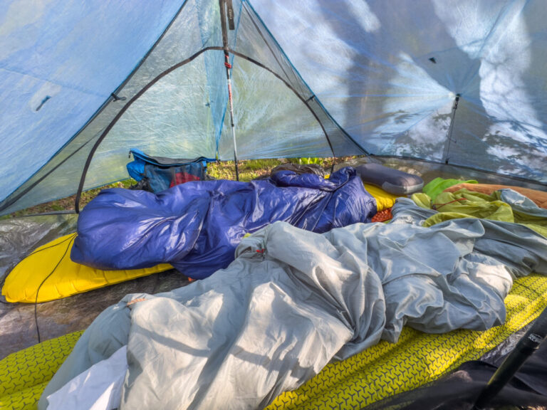 Two ultralight sleeping bags inside an ultralight tent.