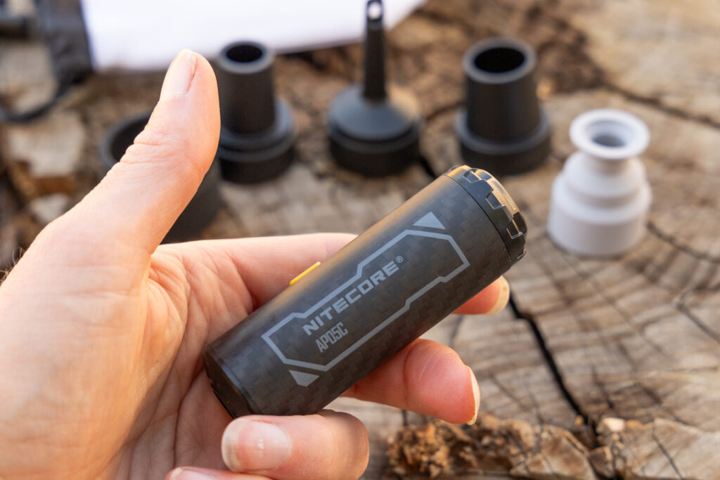 The Nitecore ultralight pad pump fits in a few fingers of one hand.