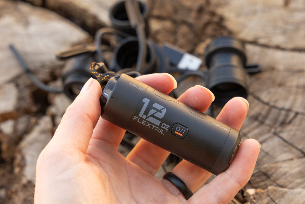 The FlexTail Zero ultralight sleeping pad pump fits in a few fingers of one hand.