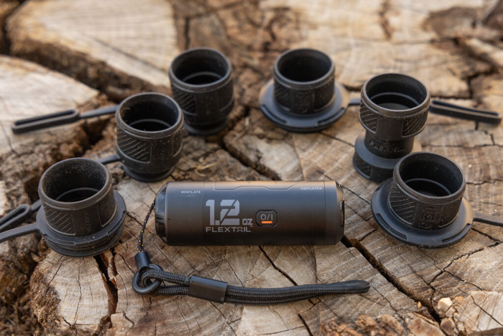 The FlexTail Zero ultralight sleeping pad pump with adapters.