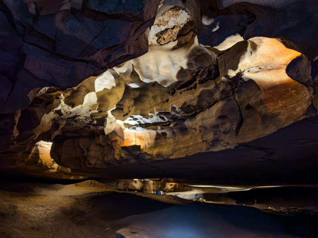 A view of a large, open room seen from a cavern tour in The Caverns in Monteagle, TN.