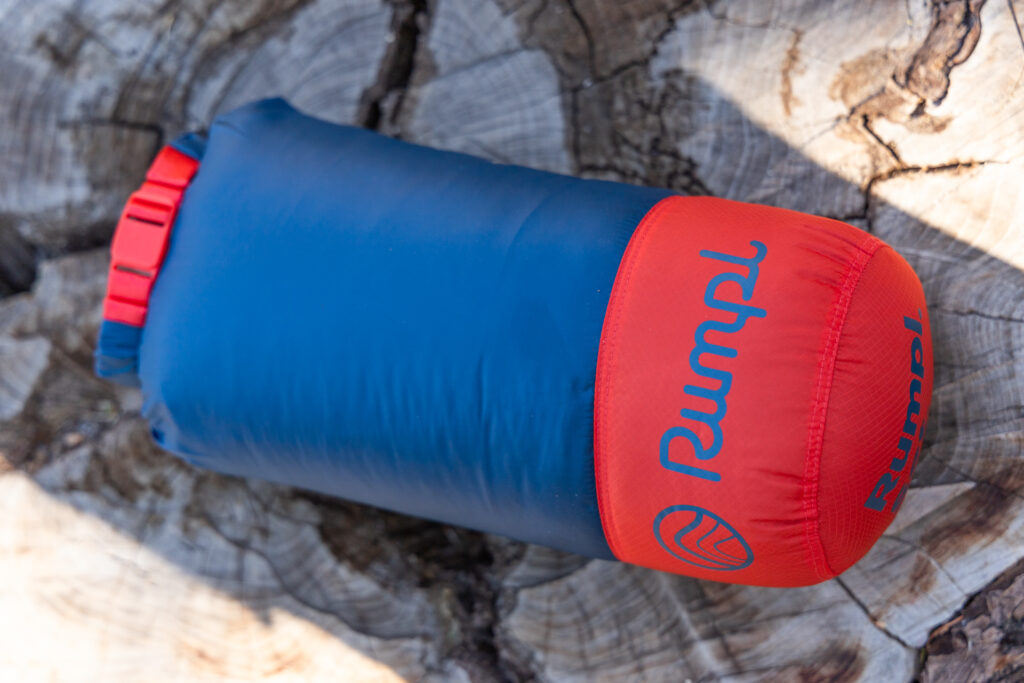Packed and compressed Rumpl blanket.