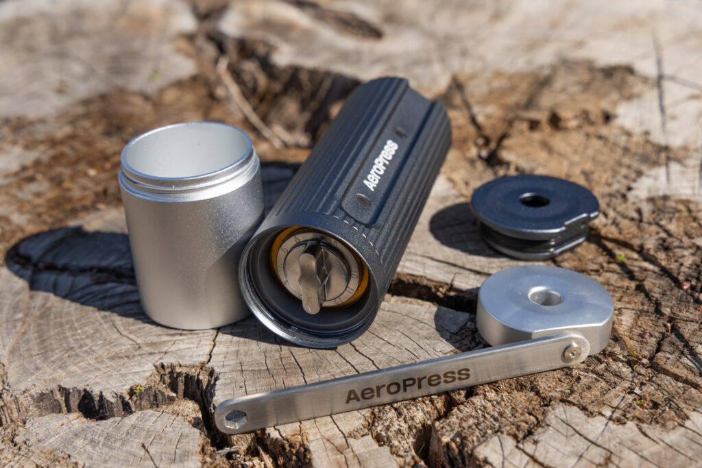 An exploded view of The AeroPress Manual Coffee Grinder.