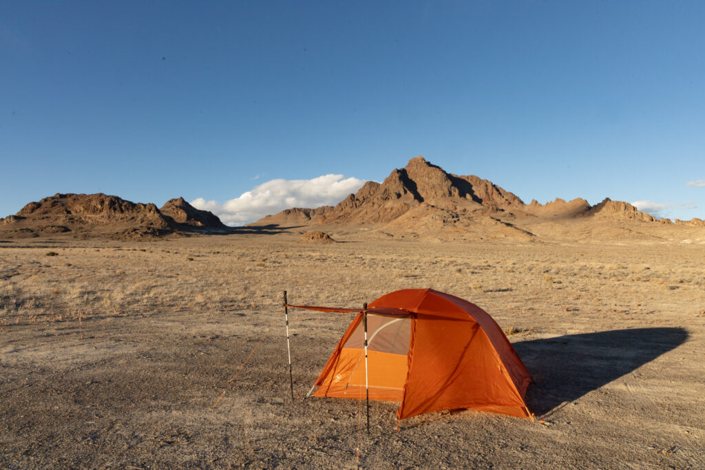 A lone tents in the desert at a dispersed campsite on BLM land.