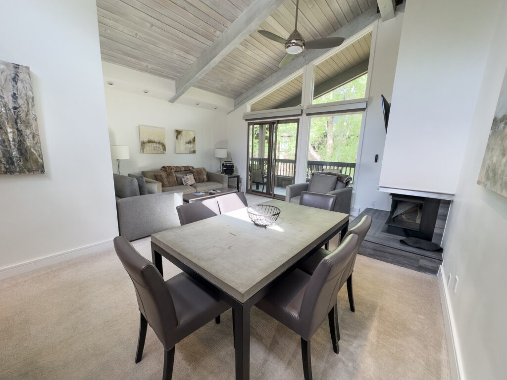 The living room and dining room in a room at The Gant Aspen.